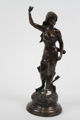 Lot 4 - A bronze figure of a lady, shown with arm...