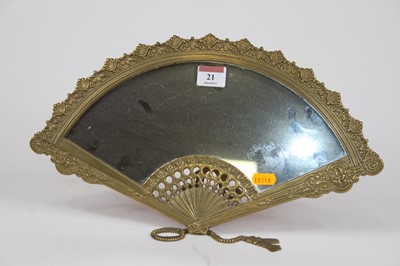 Lot 21 - A brass easel mirror in the form of a fan, w.38cm
