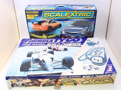 Lot 1622 - A collection of three various boxed Scalextric...