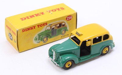 Lot 1144 - Dinky Toys No. 254 Austin Taxi comprising a...