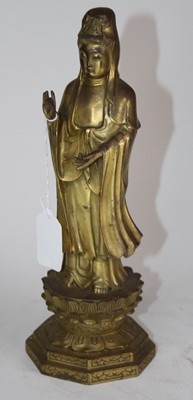 Lot 45 - A gilt metal figure of Guanyin, h.27.5cm
