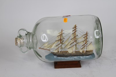 Lot 65 - A model of the Cutty Sark contained within a...