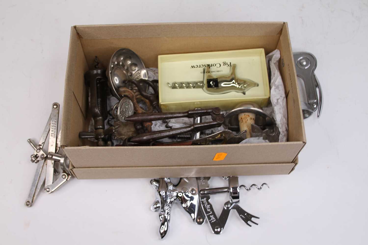 Lot 98 - A collection of corkscrews, to include novelty...