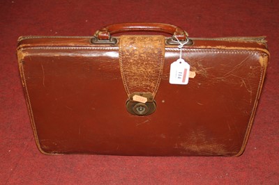 Lot 114 - A vintage tan leather briefcase