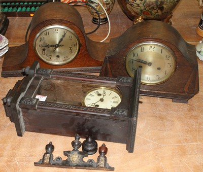Lot 127 - An early 20th century oak cased mantel clock,...