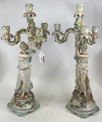 Lot 130 - A pair of German figural porcelain table...