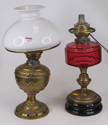 Lot 133 - A Victorian brass oil lamp, having a milk...