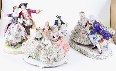 Lot 136 - A collection of four German porcelain figure...