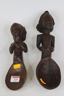 Lot 225 - A pair of African carved wooden figural spoons,...