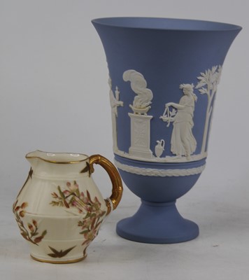 Lot 251 - A Royal Worcester Old Ivory jug, shape No.1185;...