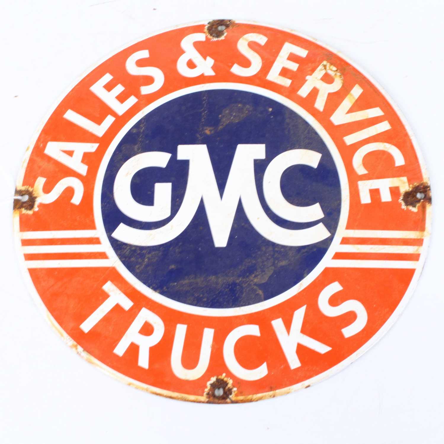 Lot 170 - An enamel sign inscribed GMC Sales & Service...