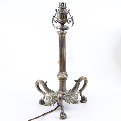 Lot 182 - A 19th century brass table lamp in the form of...