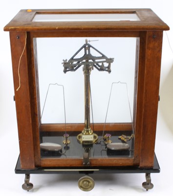 Lot 181 - A mahogany cased set of brass scales, h.51cm,...