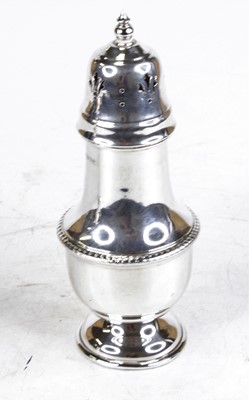 Lot 303 - An Elizabeth II silver lighthouse sifter, of...