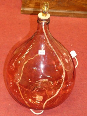 Lot 1075 - A coloured glass carboy converted into a lamp