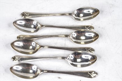 Lot 297 - A set of six silver teaspoons, each decorated...