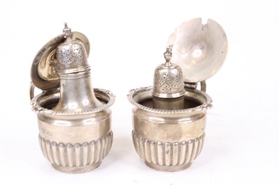 Lot 308 - A pair of Victorian silver mustards, London...