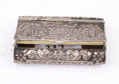 Lot 312 - A Victorian white metal snuff box, decorated...