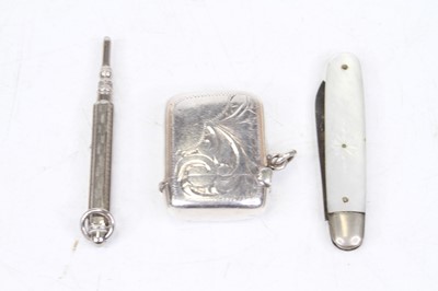 Lot 317 - A Victorian silver vesta case; together with a...