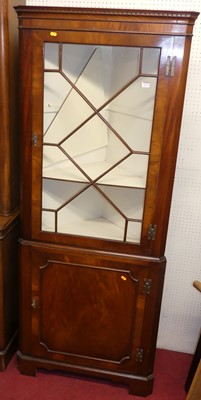 Lot 1122 - A mahogany freestanding corner cupboard,...