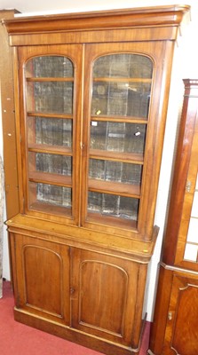 Lot 1123 - A Victorian mahogany round cornered bookcase...