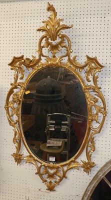 Lot 1125 - A Rococo revival gilt composition framed oval...