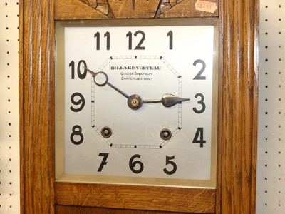 Lot 1127 - An Art Deco oak drop trunk wall clock, by...