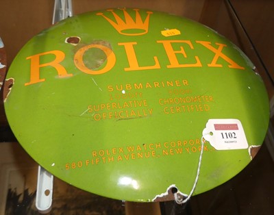 Lot 1102 - A convex enamel advertising sign, dia.30cm