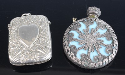 Lot 352 - A white metal pocket vesta case; together with...