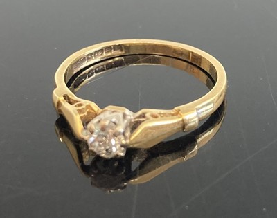 Lot 360 - An 18ct gold diamond solitaire ring, the claw...