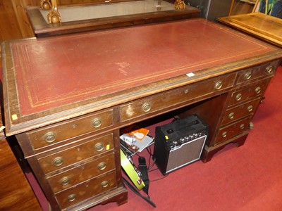 Lot 1183 - A mahogany twin pedestal writing desk, having...