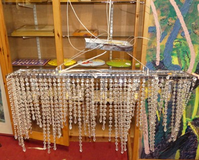 Lot 1187 - A contemporary chromed metal hanging ceiling...