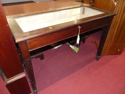 Lot 1189 - A mahogany hinge top glazed display table,...