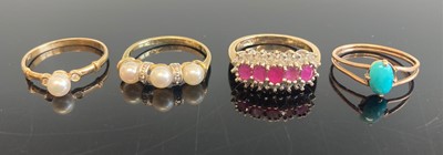 Lot 369 - A modern 9ct gold, ruby and diamond point set...