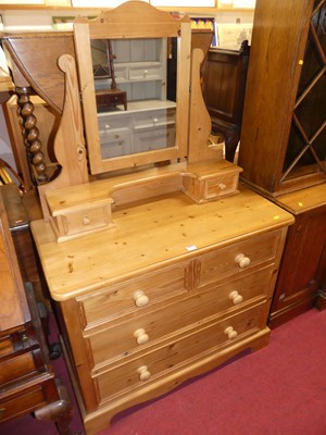 Lot 1194 - A modern pine round cornered mirrorback...