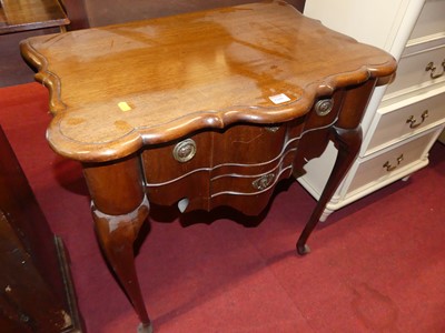 Lot 1200 - An early 20th century Dutch two drawer lowboy,...