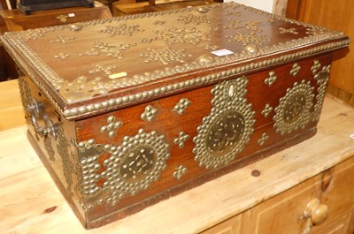 Lot 1218 - A hardwood and brass studded Zanzibar chest,...