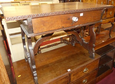 Lot 1230 - A 19th century Spanish walnut single drawer...