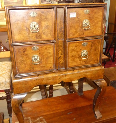 Lot 1232 - An unusual antique figured walnut four drawer...