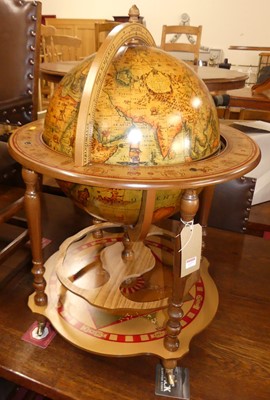 Lot 1237 - A contemporary freestanding globe bar, with...