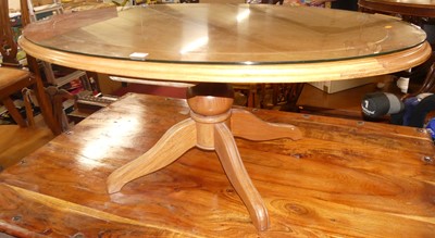 Lot 1251 - A contemporary cherry wood oval coffee table,...