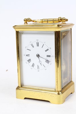 Lot 423 - A lacquered brass cased carriage timepiece...