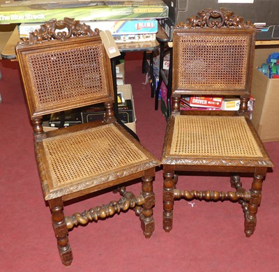 Lot 1260 - A pair of 19th century carved oak cane back...