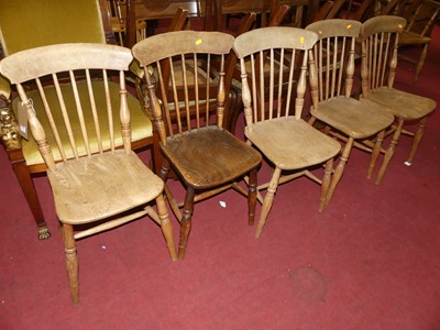 Lot 1279 - A set of five early 20th century elm seat and...