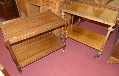 Lot 1284 - Two mid-20th century two-tier tea trolleys,...