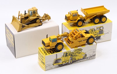 Lot 1588 - Three boxed 1/50 scale Caterpillar related...