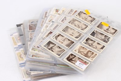 Lot 477 - A collection of cigarette cards to include...