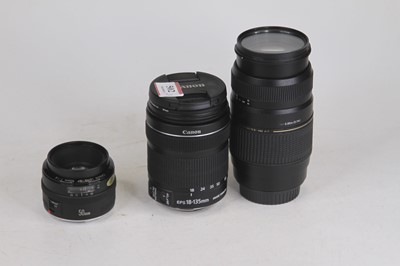 Lot 502 - A Canon 18-135mm camera lens; together with a...