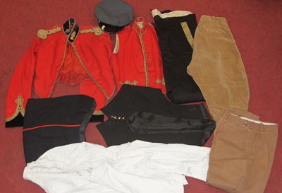 Lot 589 - A collection of assorted military uniforms, to...