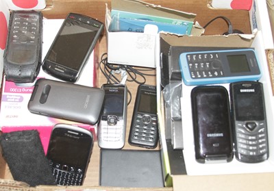 Lot 613 - A collection of mobile phones and accessories,...